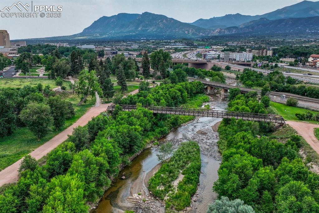 75 East Boulder Street Colorado Springs, CO 80903 - Photo 45 of 50 a view of a city with lush green forest