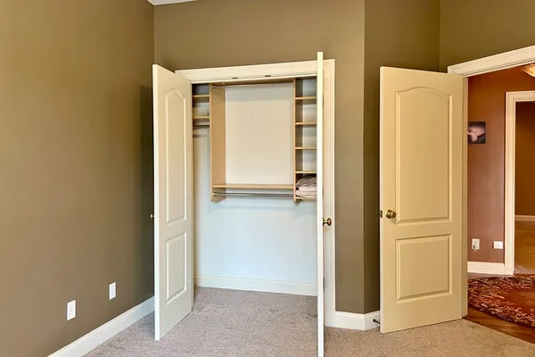 a view of a bathroom with a glass door