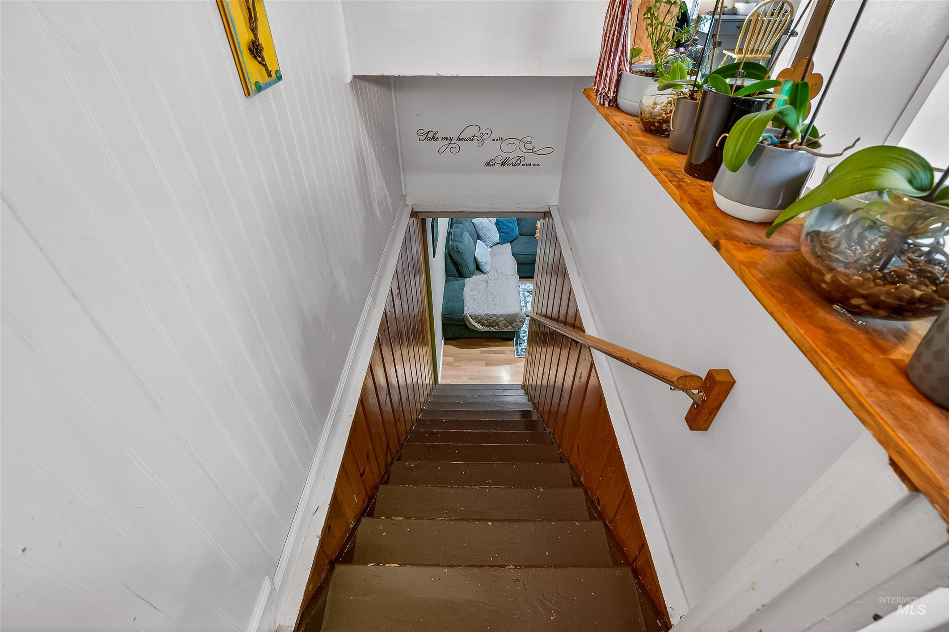 835 12th Street Clarkston, WA 99403 - Photo 15 of 39 Stairs featuring wooden walls
