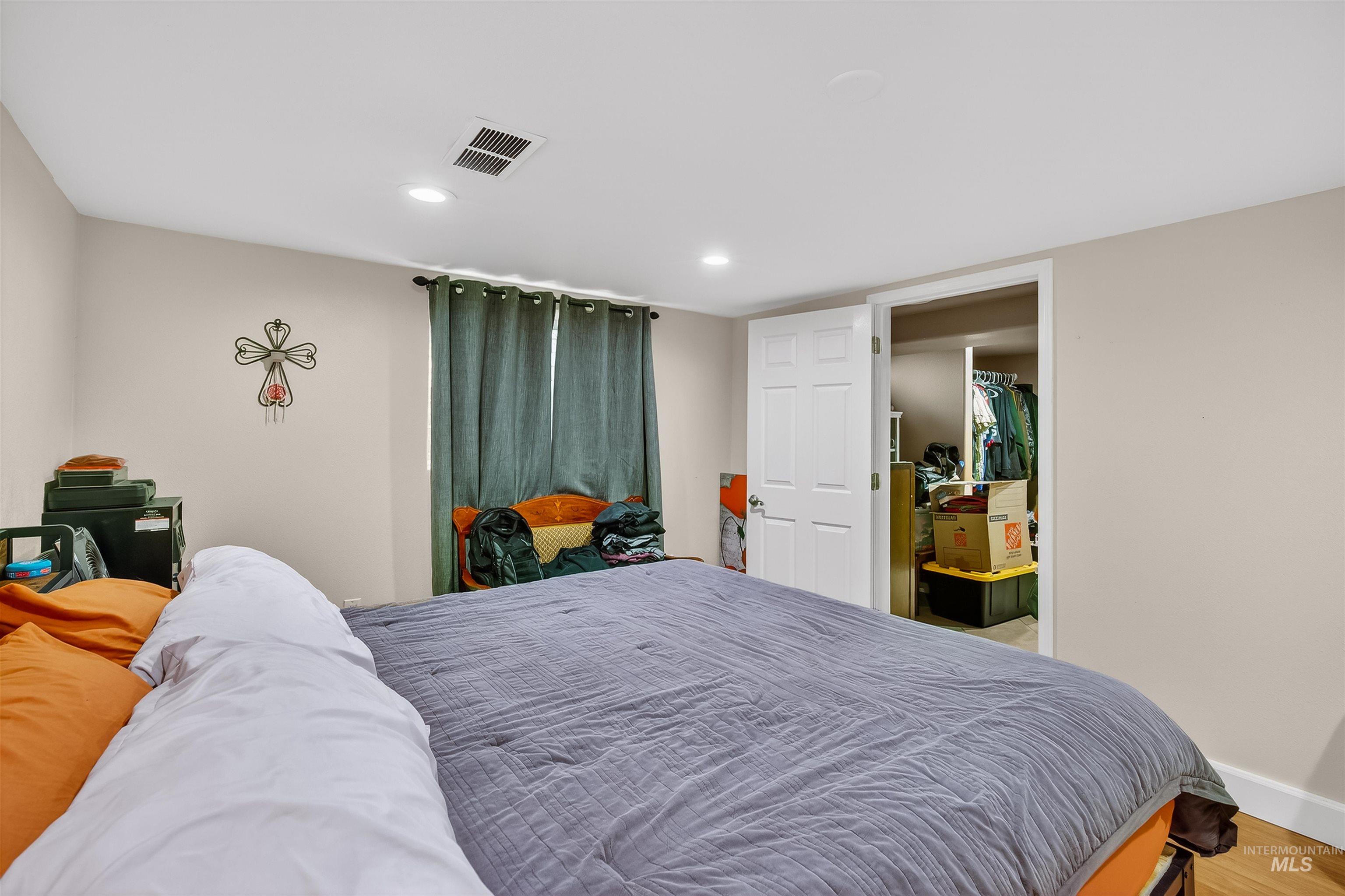 835 12th Street Clarkston, WA 99403 - Photo 20 of 39 Bedroom with recessed lighting and wood finished floors