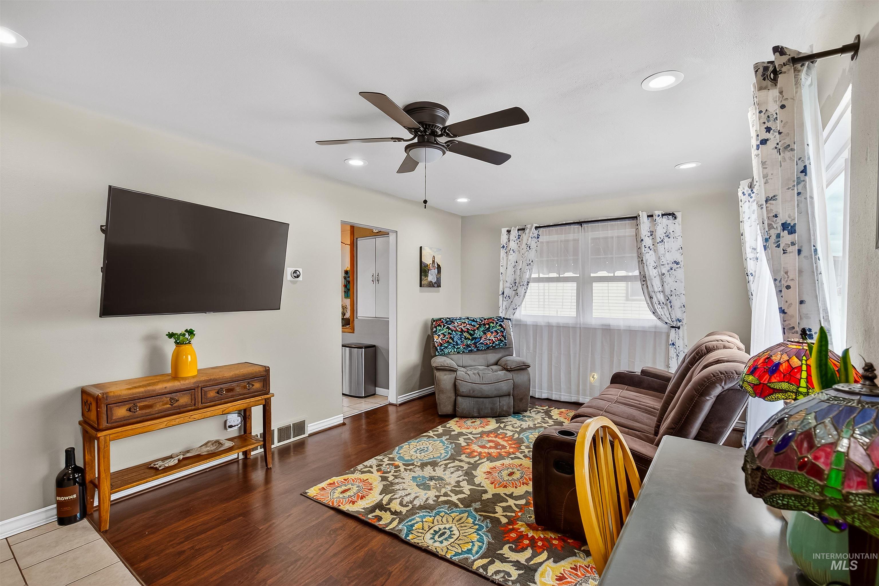 835 12th Street Clarkston, WA 99403 - Photo 5 of 39 Living room with a ceiling fan, recessed lighting, and wood finished floors