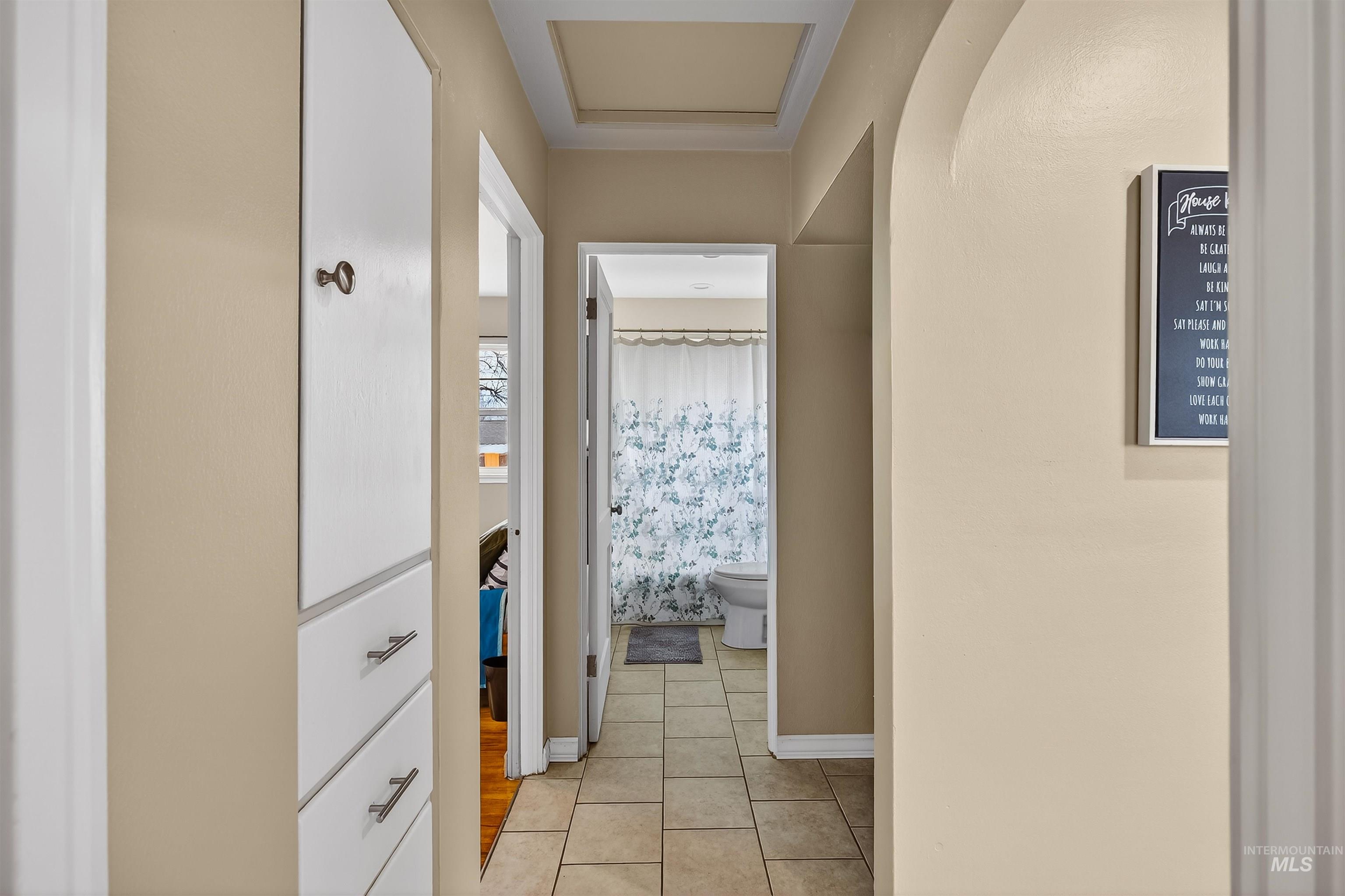 835 12th Street Clarkston, WA 99403 - Photo 9 of 39 Hall with light tile patterned floors and baseboards