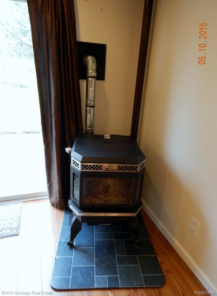 3835 Wheeler Road Fowlerville, MI 48836 - Photo 20 of 25 WOOD PELLET STOVE