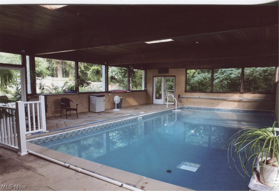 419 Mowbray Road Akron, OH 44333 - Photo 4 of 35 Enjoy swimming year-round in this beautiful indoor pool with skylights and indoor patio.
