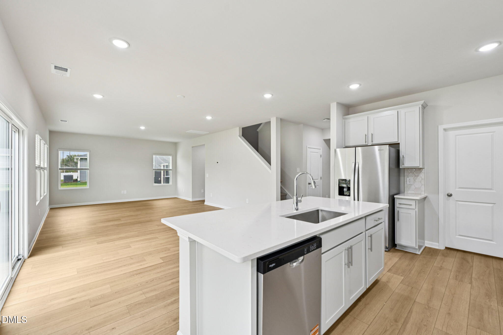 85 Thistle Patch Place Angier, NC 27501 - Photo 14 of 40 a kitchen with a sink appliances and cabinets