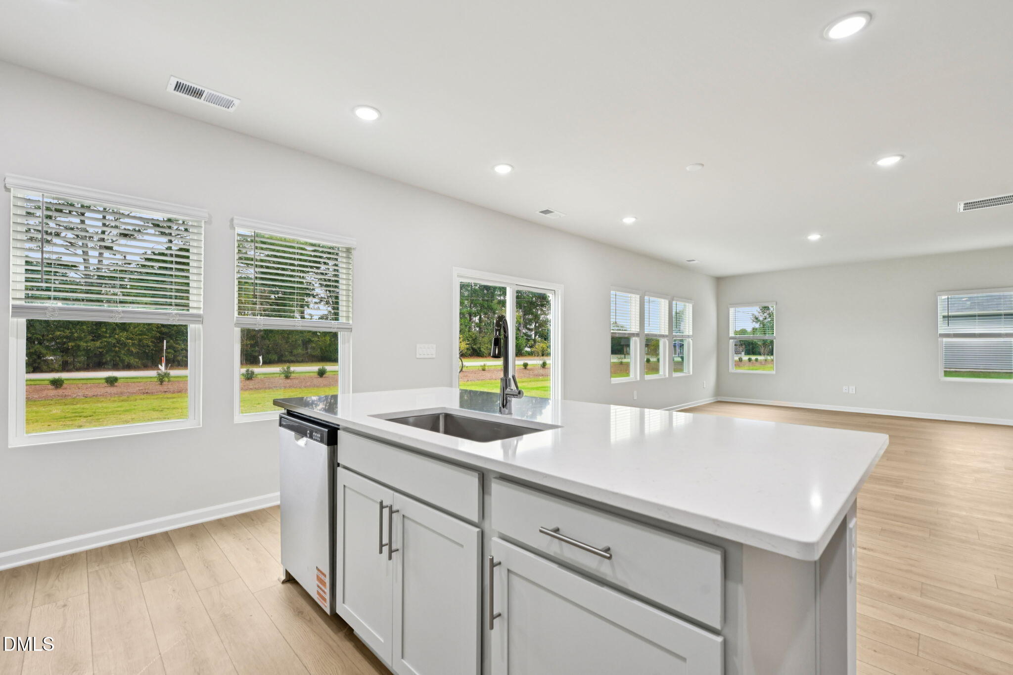 85 Thistle Patch Place Angier, NC 27501 - Photo 17 of 40 a kitchen with sink and windows