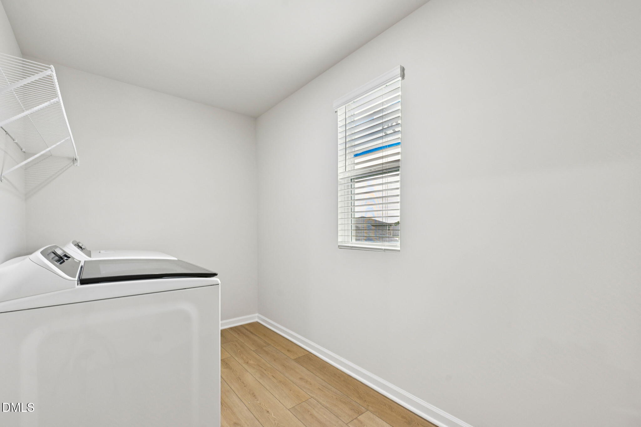 85 Thistle Patch Place Angier, NC 27501 - Photo 23 of 40 a utility room with dryer and washer