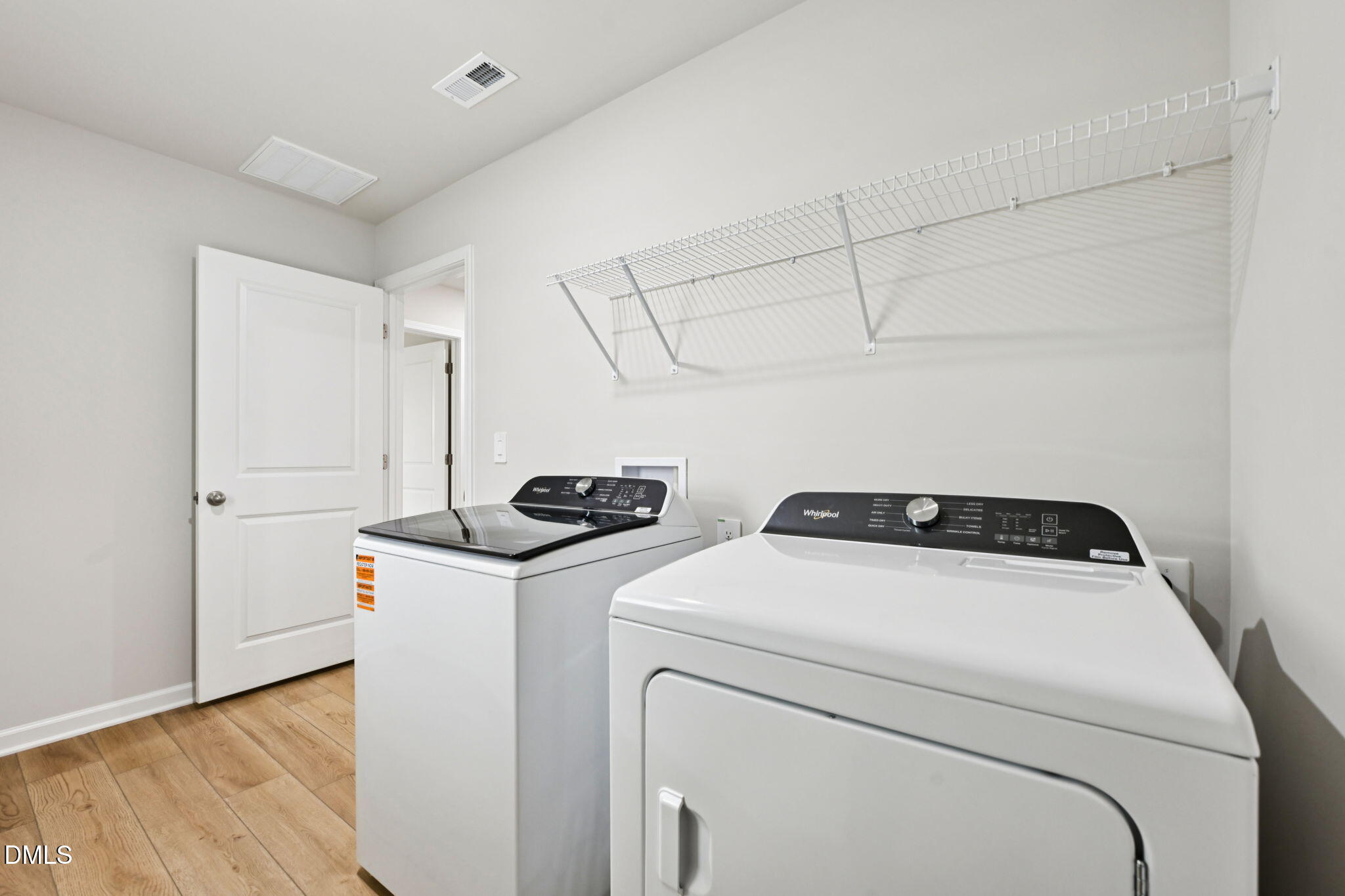 85 Thistle Patch Place Angier, NC 27501 - Photo 24 of 40 a utility room with dryer and washer