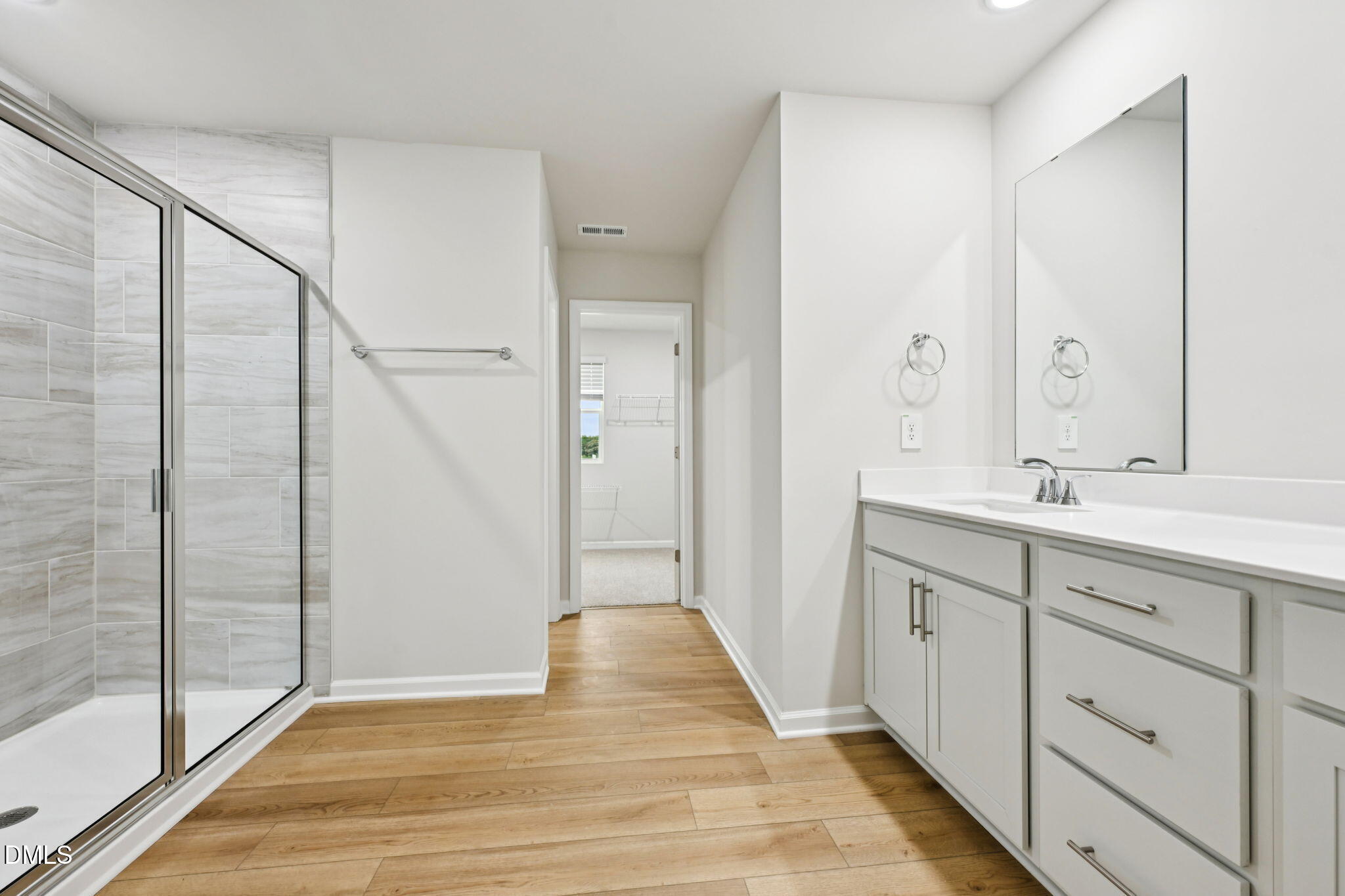 85 Thistle Patch Place Angier, NC 27501 - Photo 29 of 40 a spacious bathroom with a shower and a sink