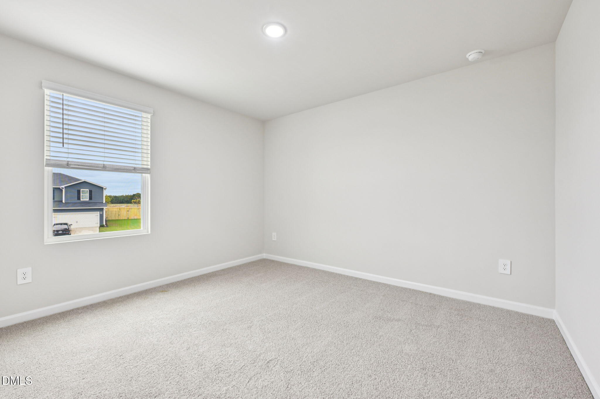 85 Thistle Patch Place Angier, NC 27501 - Photo 32 of 40 an empty room with a window