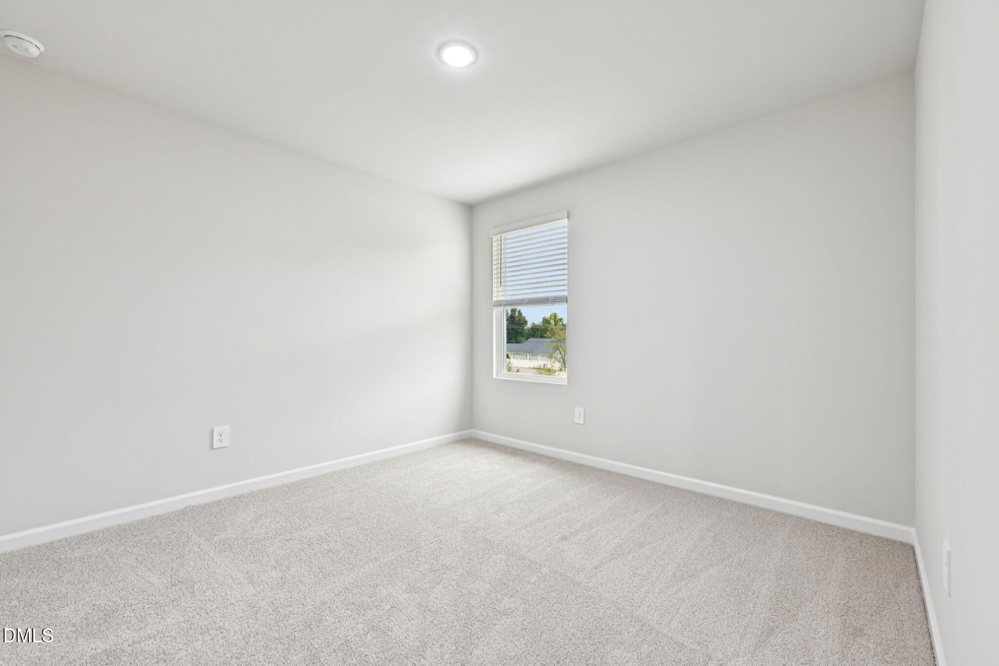 85 Thistle Patch Place Angier, NC 27501 - Photo 36 of 40 an empty room with windows