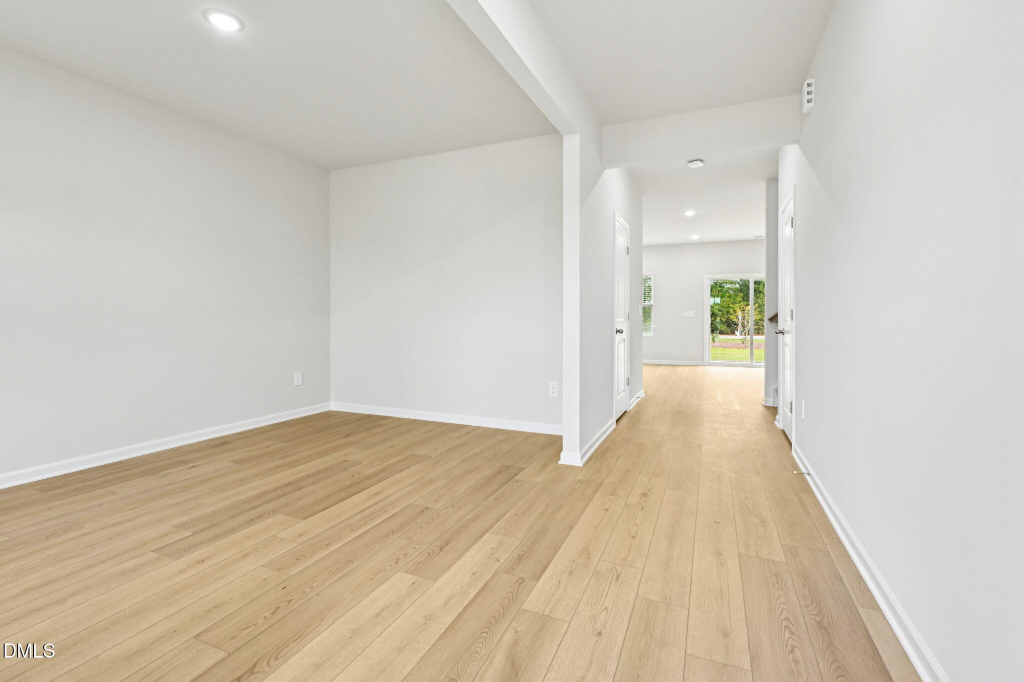 85 Thistle Patch Place Angier, NC 27501 - Photo 7 of 40 a view of a room with wooden floor