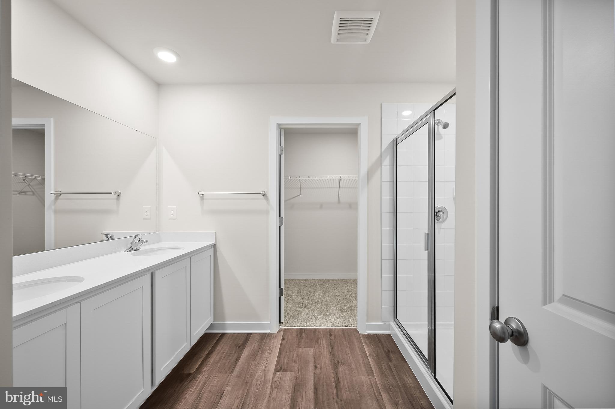 258 Eclipse Street Ranson, WV 25438 - Photo 17 of 46 a bathroom with a sink mirror and shower