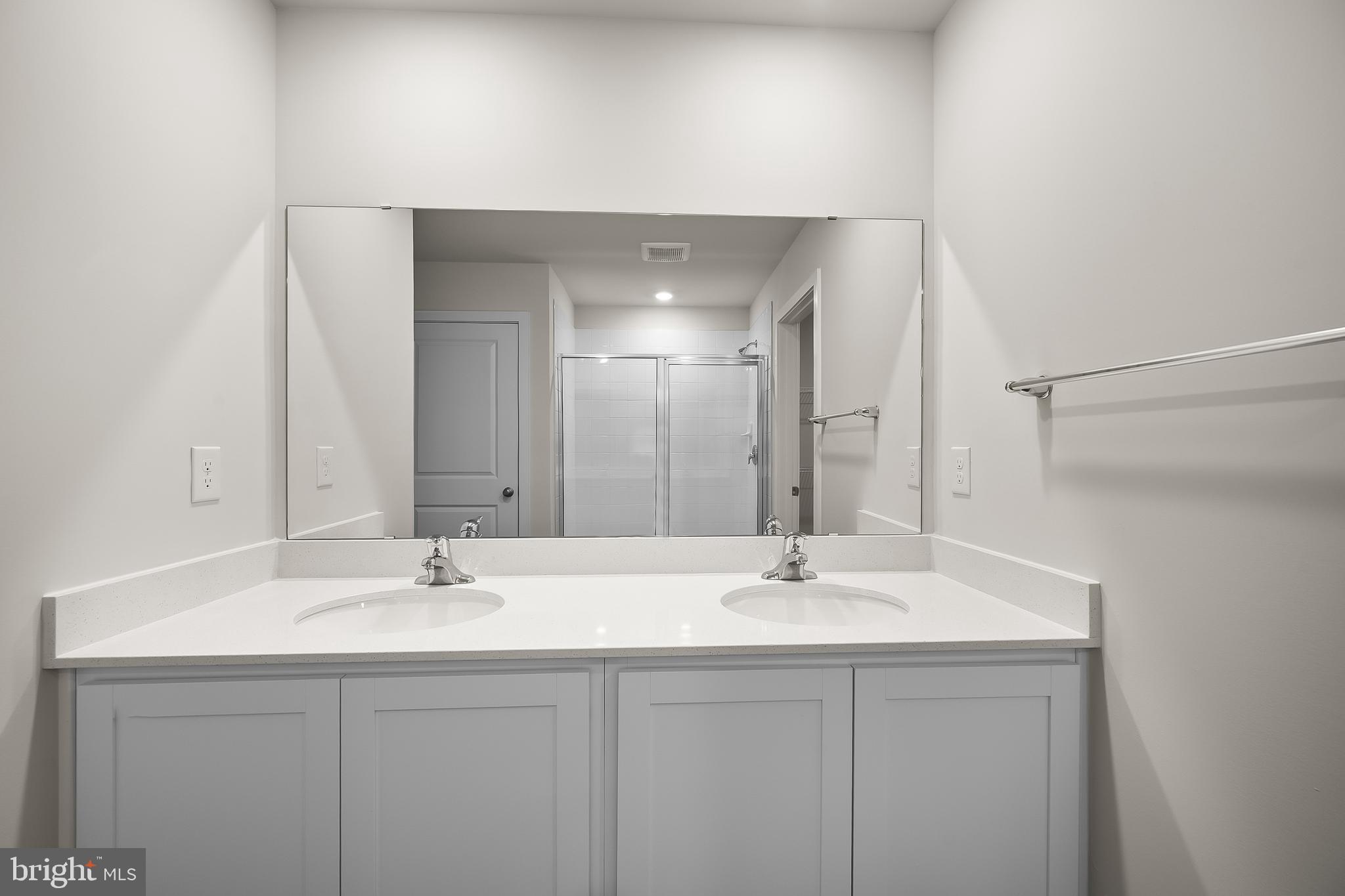 258 Eclipse Street Ranson, WV 25438 - Photo 18 of 46 a bathroom with a sink and a mirror