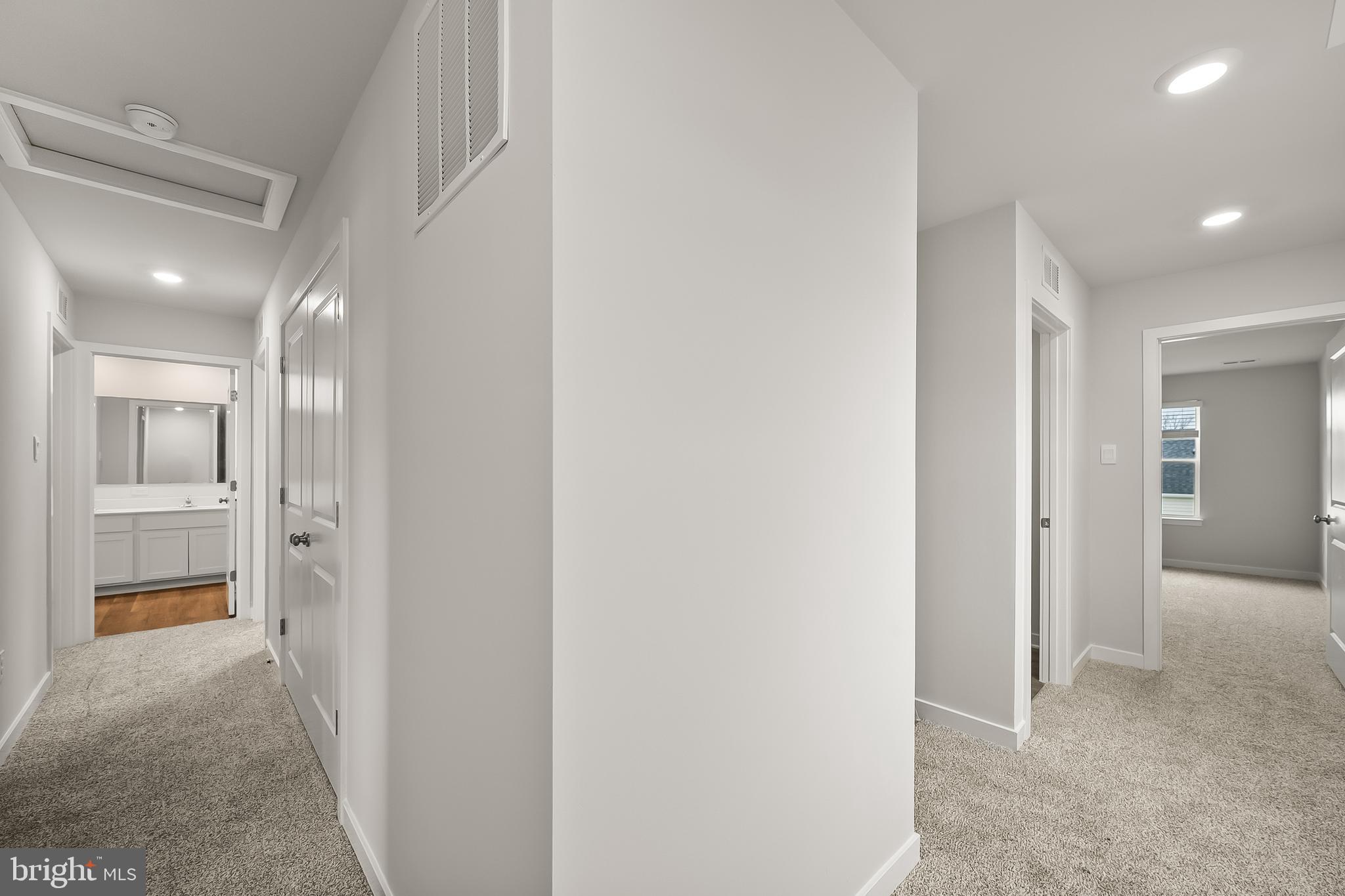 258 Eclipse Street Ranson, WV 25438 - Photo 21 of 46 a view of a hallway with wooden shelves