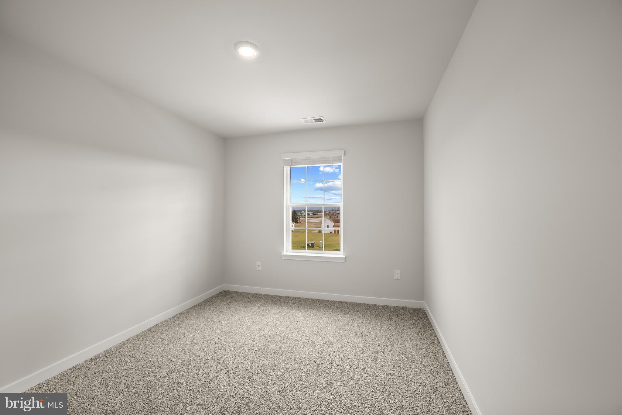 258 Eclipse Street Ranson, WV 25438 - Photo 23 of 46 an empty room with a window
