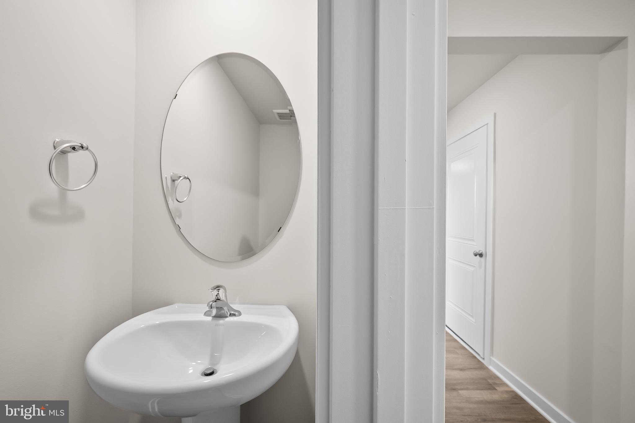 258 Eclipse Street Ranson, WV 25438 - Photo 3 of 46 a bathroom with a sink and a mirror