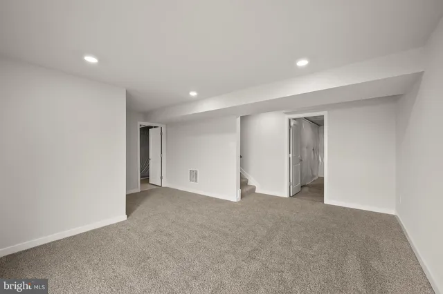 a view of a room with windows