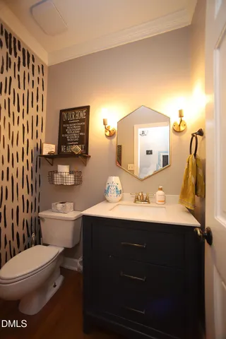 a dining room with furniture and a chandelier