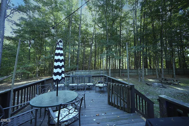 a bedroom with bed and a couch