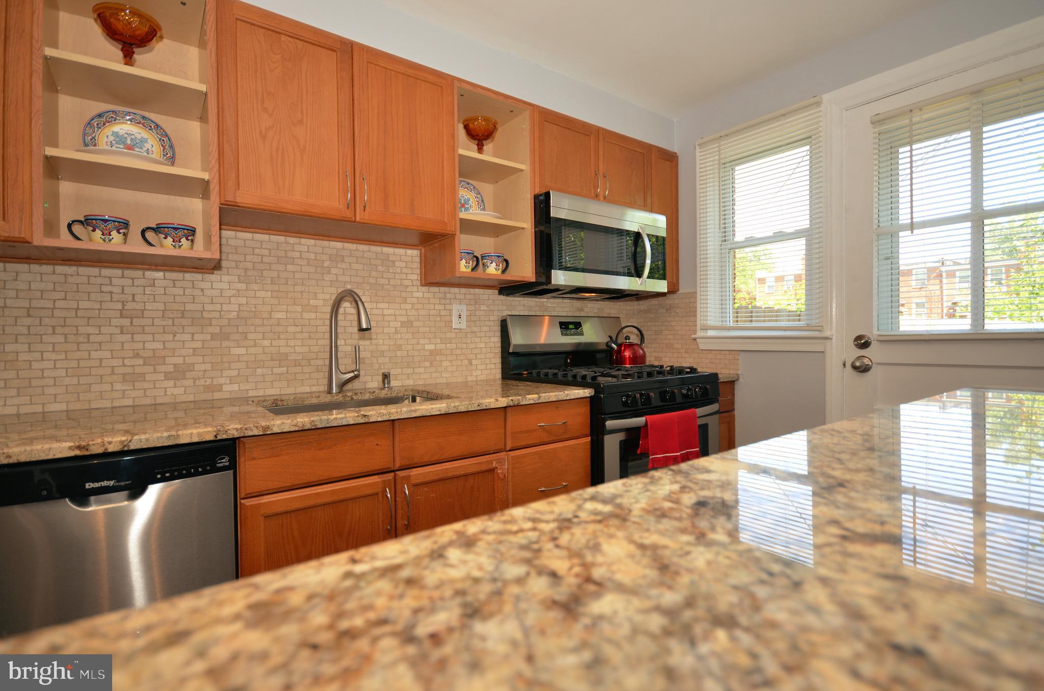 3665 Clarenell Road Baltimore, MD 21229 - Photo 2 of 42 Updated custom kitchen with granite and stainless