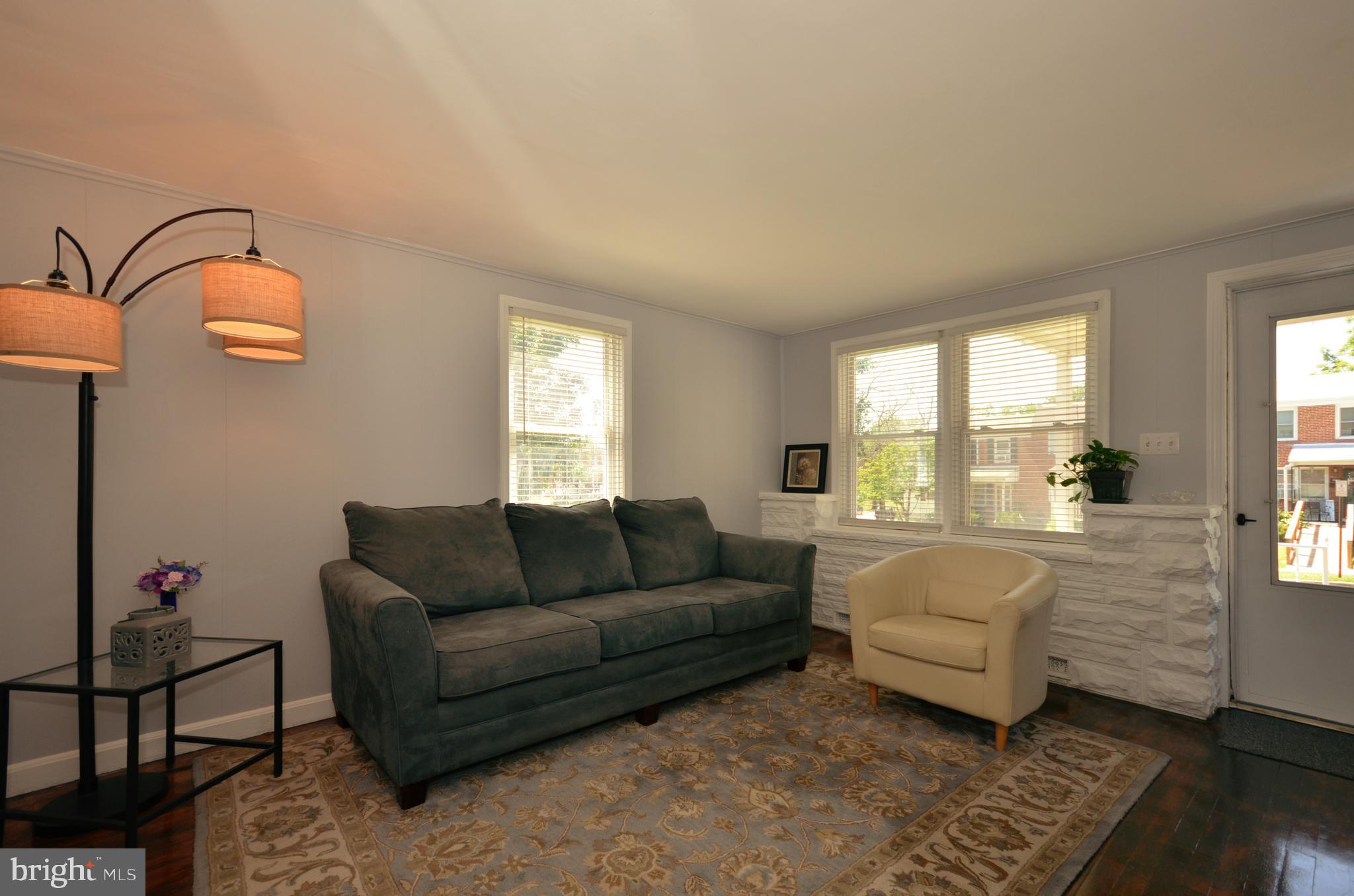 3665 Clarenell Road Baltimore, MD 21229 - Photo 21 of 42 Light-filled living room, new double-pane windows