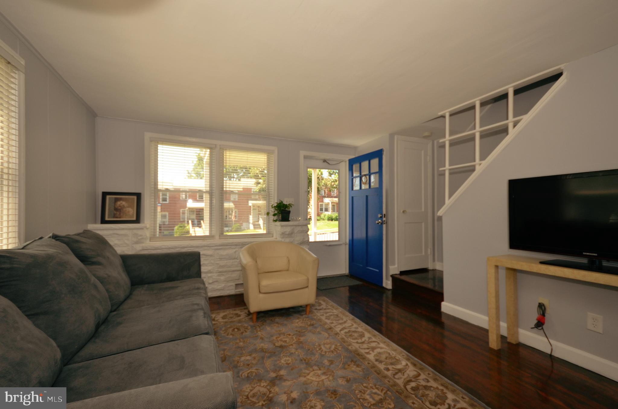 3665 Clarenell Road Baltimore, MD 21229 - Photo 22 of 42 Light-filled living room, new double-pane windows