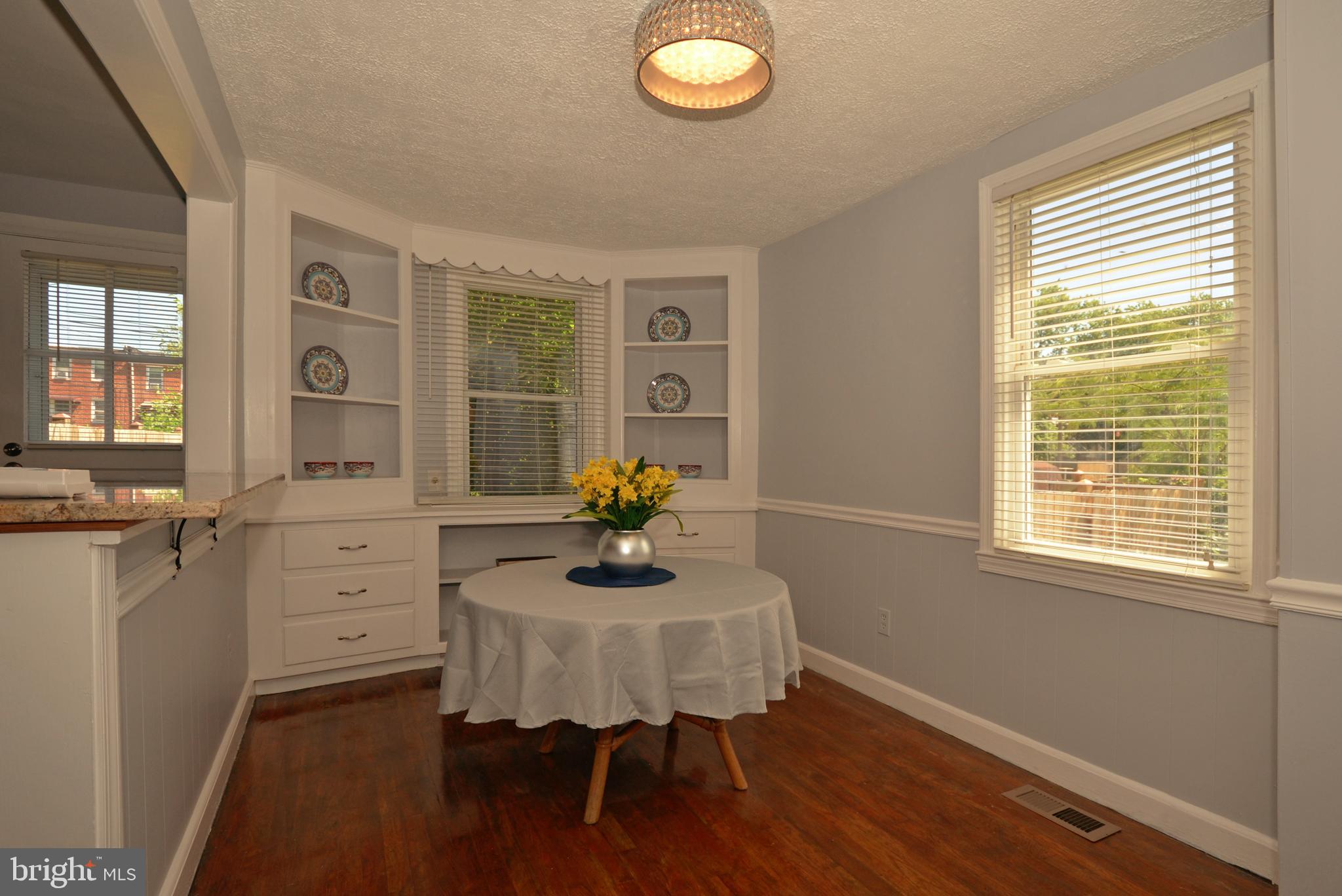 3665 Clarenell Road Baltimore, MD 21229 - Photo 23 of 42 Dining room with hardwoods and built in cabinets