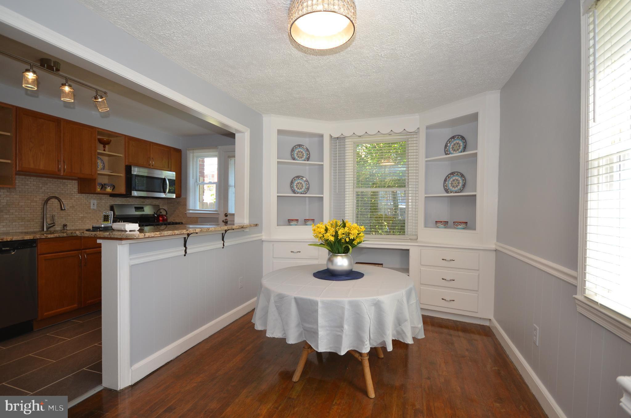 3665 Clarenell Road Baltimore, MD 21229 - Photo 24 of 42 Dining room with hardwoods and built in cabinets