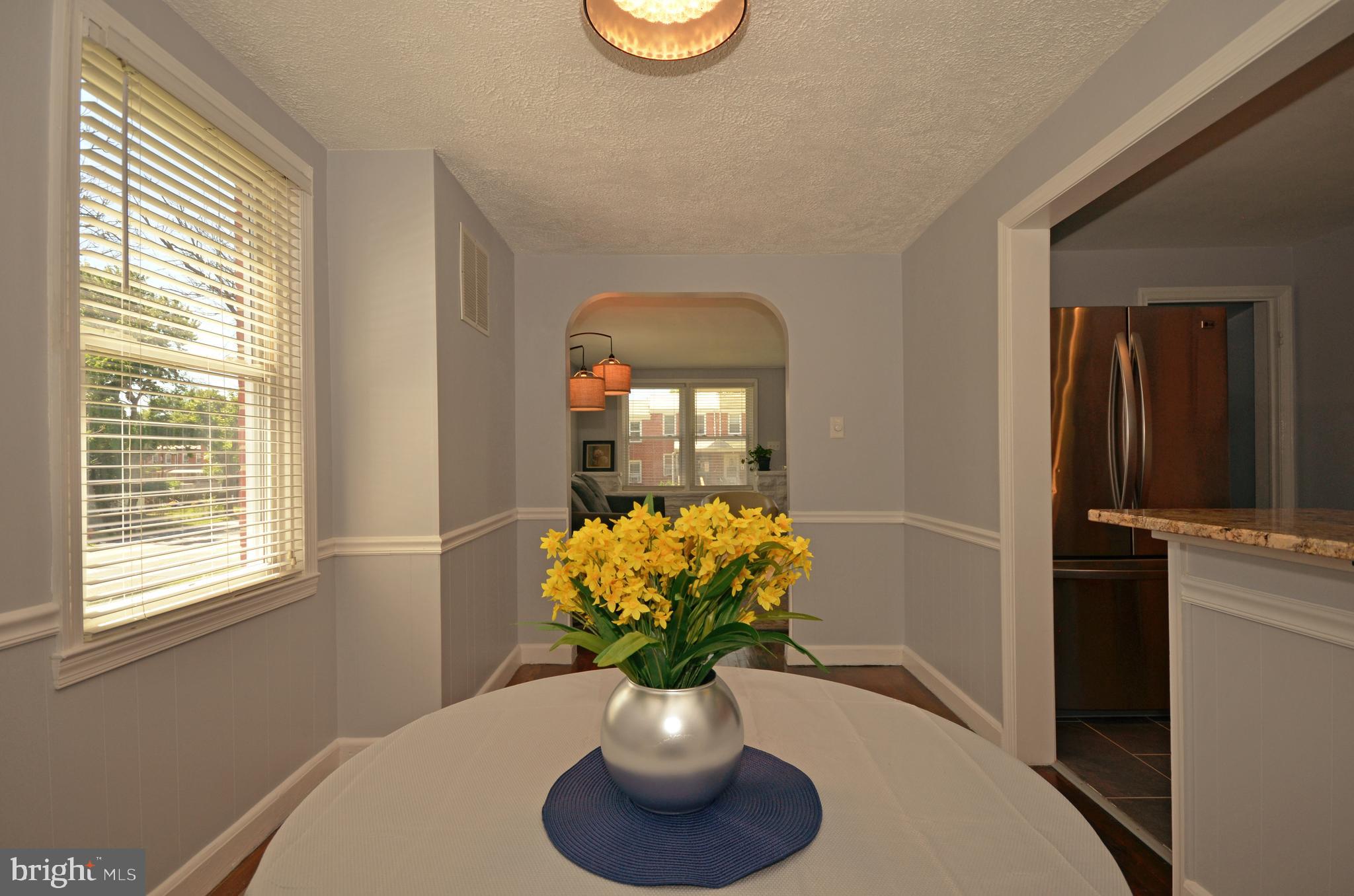 3665 Clarenell Road Baltimore, MD 21229 - Photo 27 of 42 Dining room with hardwoods and built in cabinets