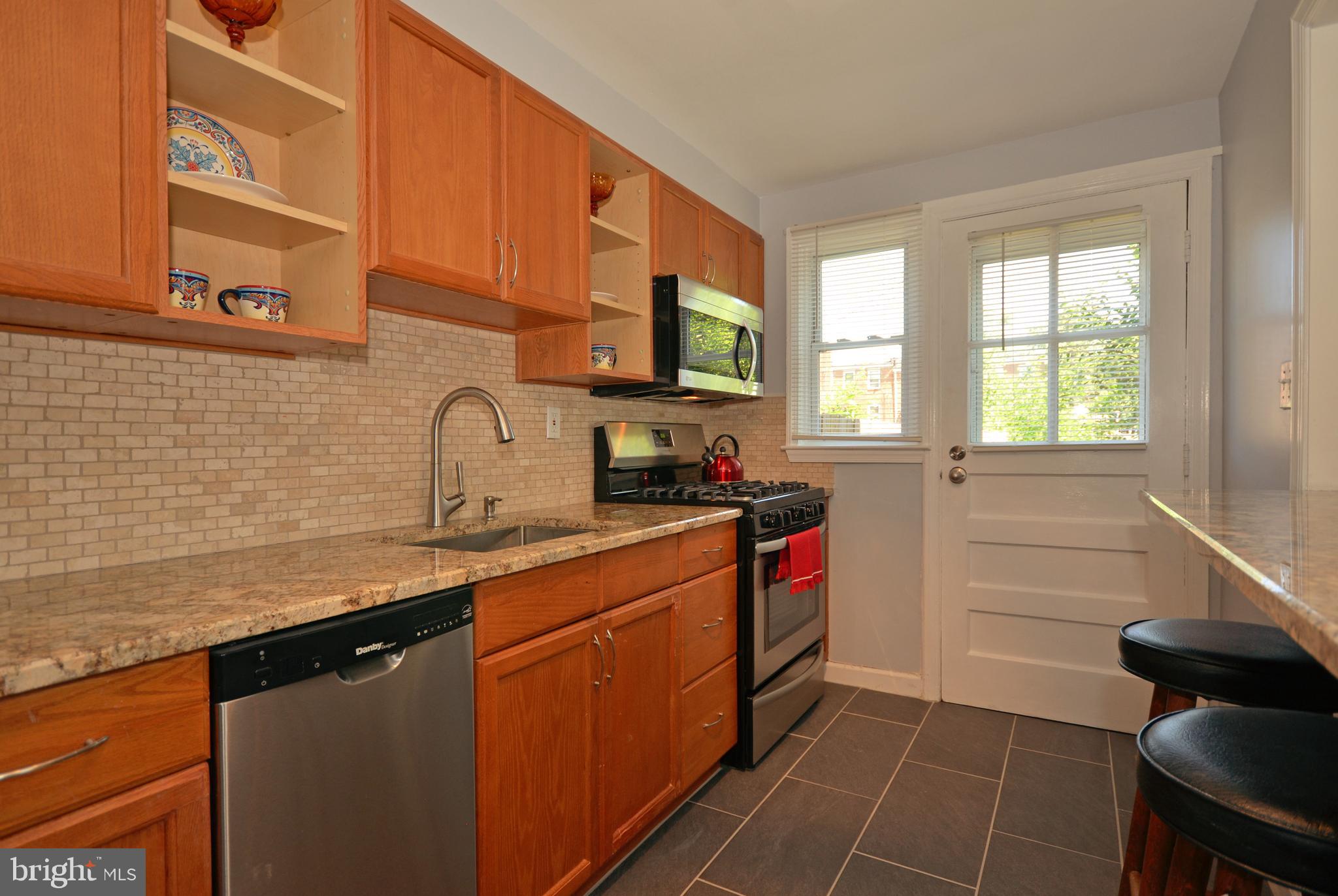 3665 Clarenell Road Baltimore, MD 21229 - Photo 28 of 42 Dining room with hardwoods and built in cabinets
