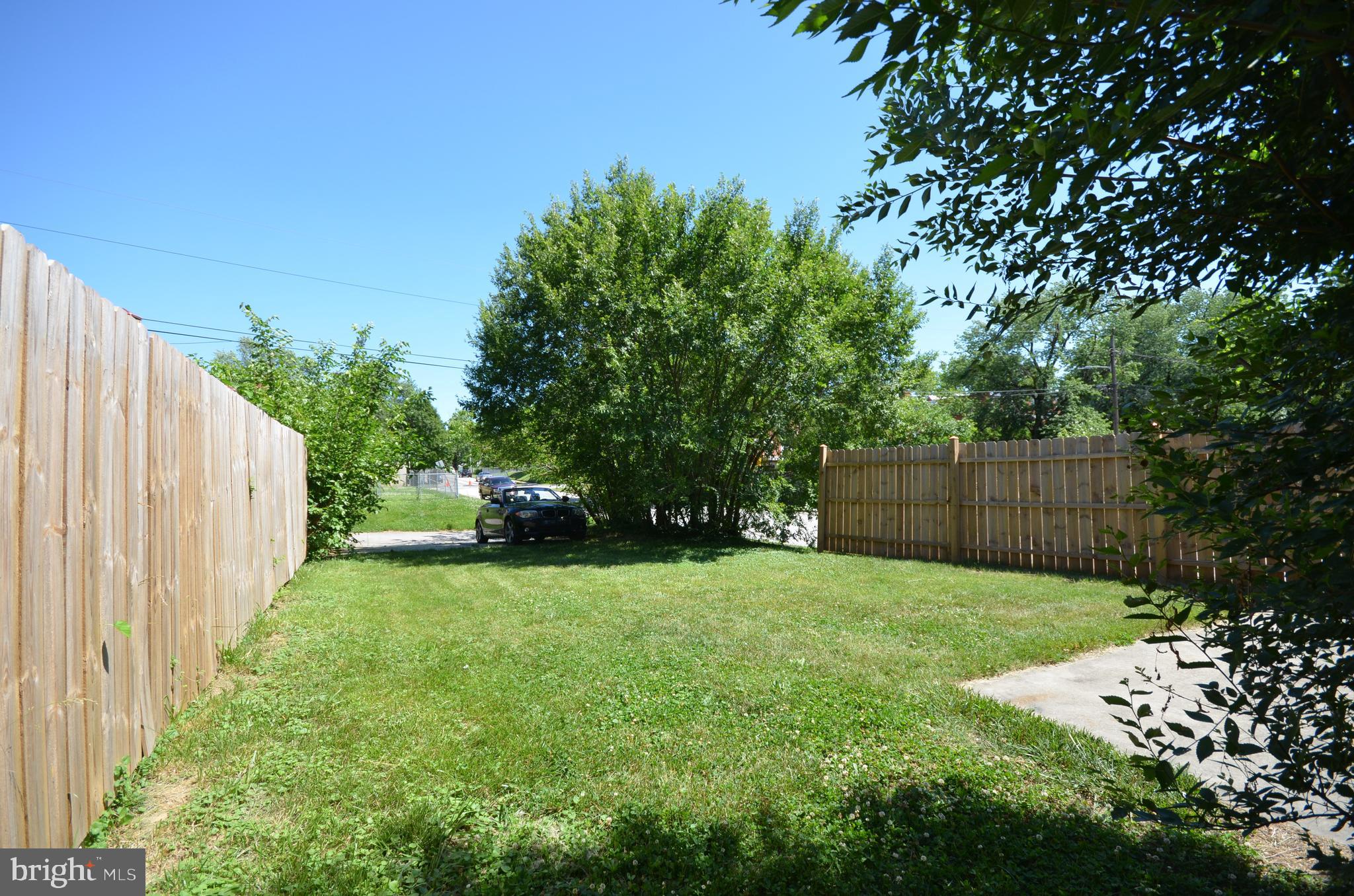 3665 Clarenell Road Baltimore, MD 21229 - Photo 41 of 42 Back yard with large patio and privacy fence