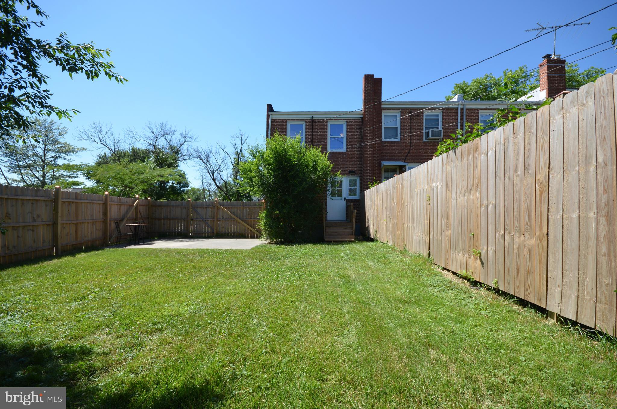 3665 Clarenell Road Baltimore, MD 21229 - Photo 42 of 42 Back yard with large patio and privacy fence