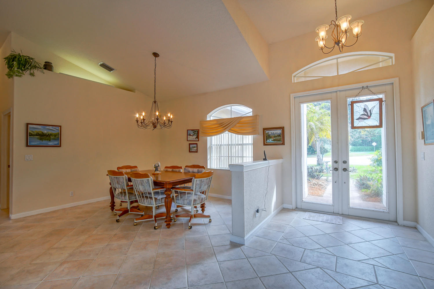 107 Nottingham Road Royal Palm Beach, FL 33411 - Photo 10 of 27 Vaulted ceiling in living areas