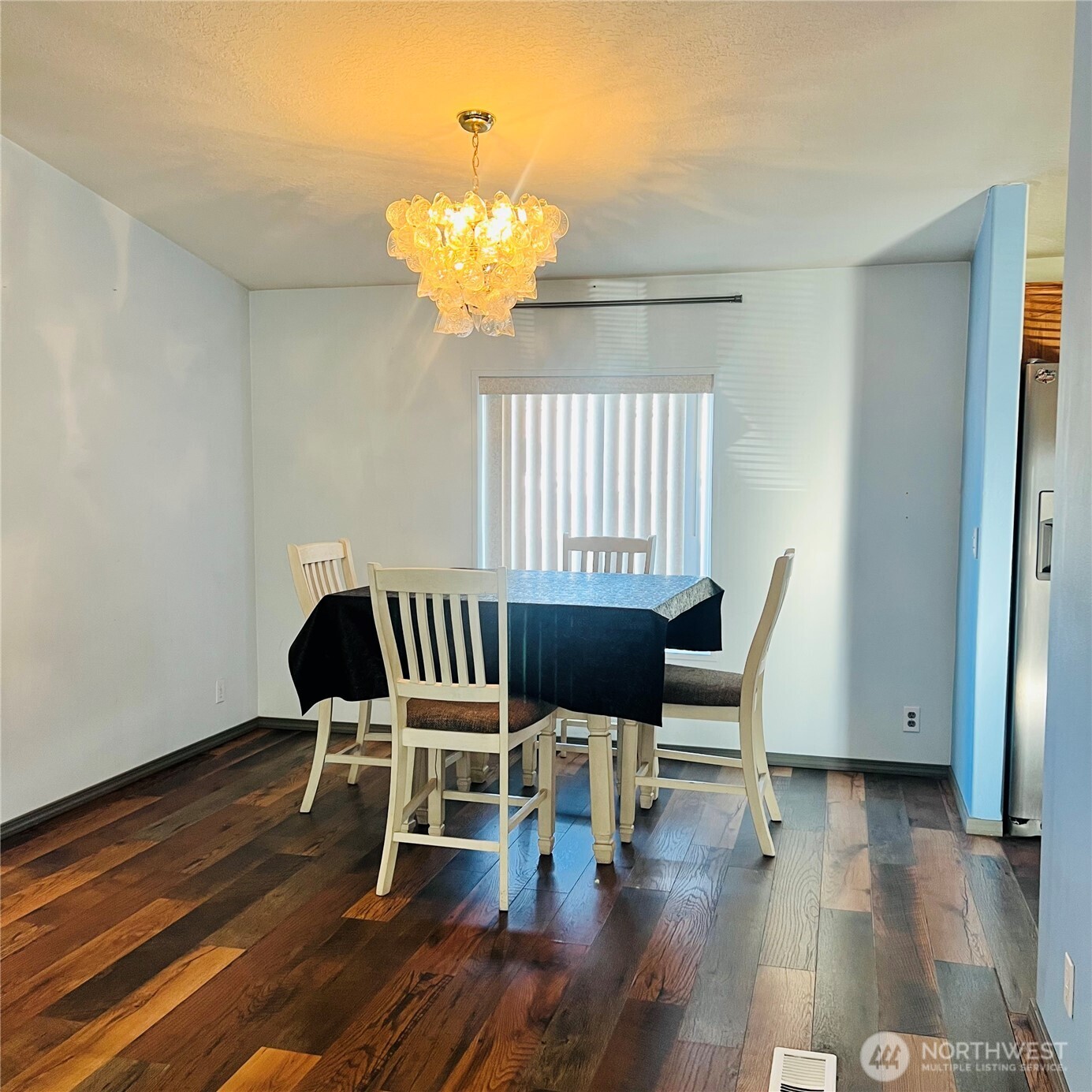 369 South Kentucky Avenue East Wenatchee, WA 98802 - Photo 4 of 20 a view of a dining room with furniture wooden floor and chandelier