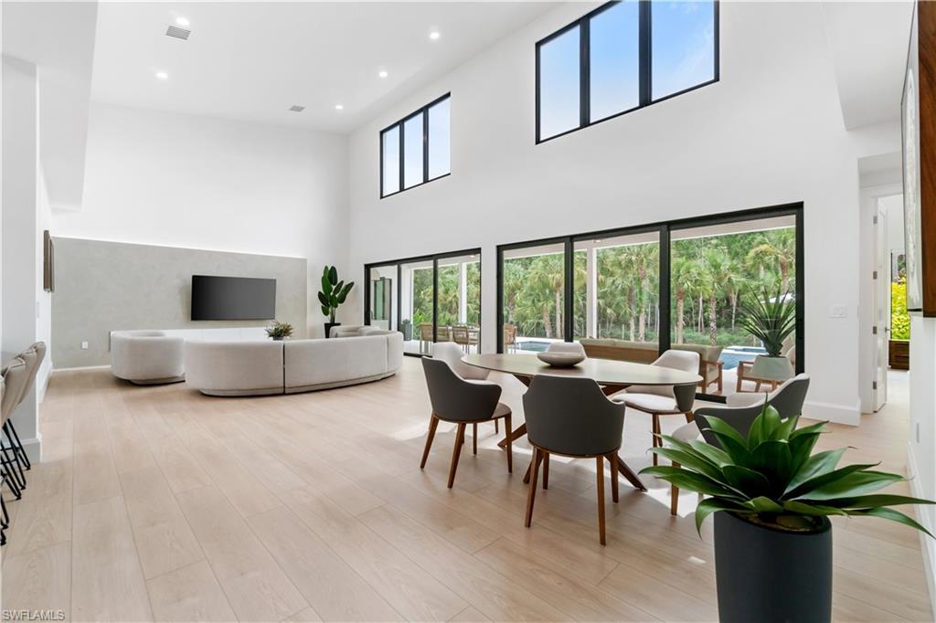 13865 Collier Boulevard Naples, FL 34119 - Photo 19 of 50 Custom kitchen with Dacor appliances and quartz countertops