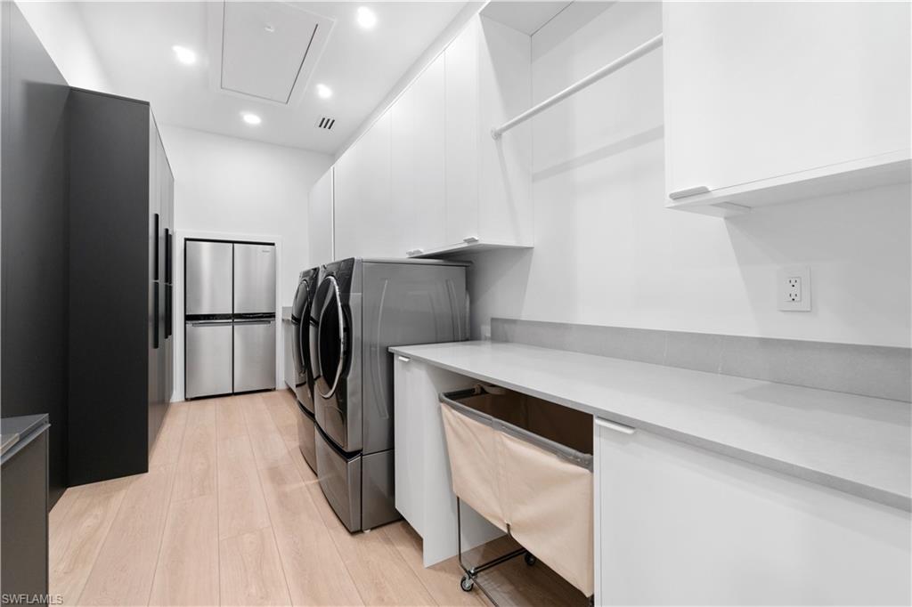 13865 Collier Boulevard Naples, FL 34119 - Photo 47 of 50 Oversized 3 car garage with doors (18' and 10' wide) with 14?-17?ceiling height, suitable for car lift