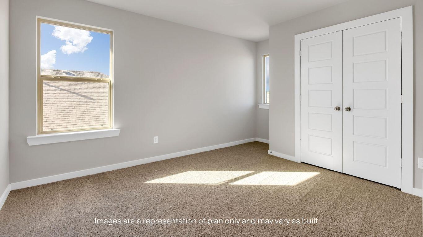 2912 134th Street Lubbock, TX 79423 - Photo 18 of 31 an empty room with windows