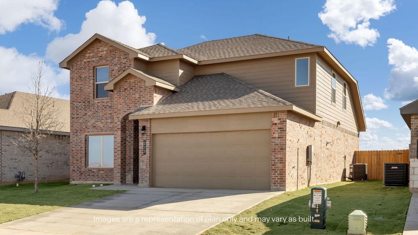 2912 134th Street Lubbock, TX 79423 - Photo 2 of 31 a front view of a house with garden