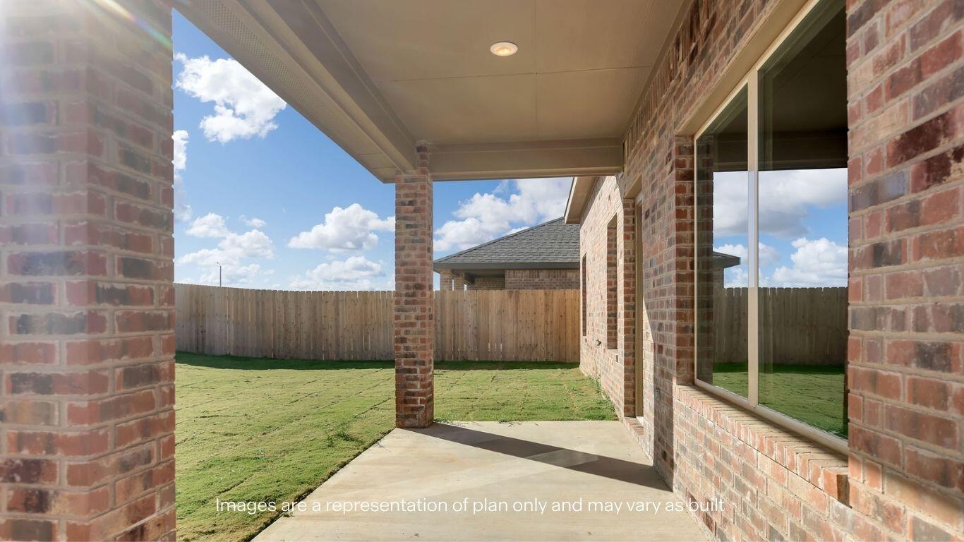 2912 134th Street Lubbock, TX 79423 - Photo 30 of 31 a view of a back yard from a room