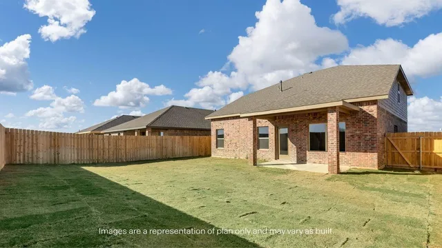 a view of a backyard of the house