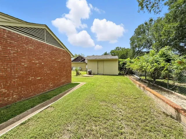 a view of backyard of house
