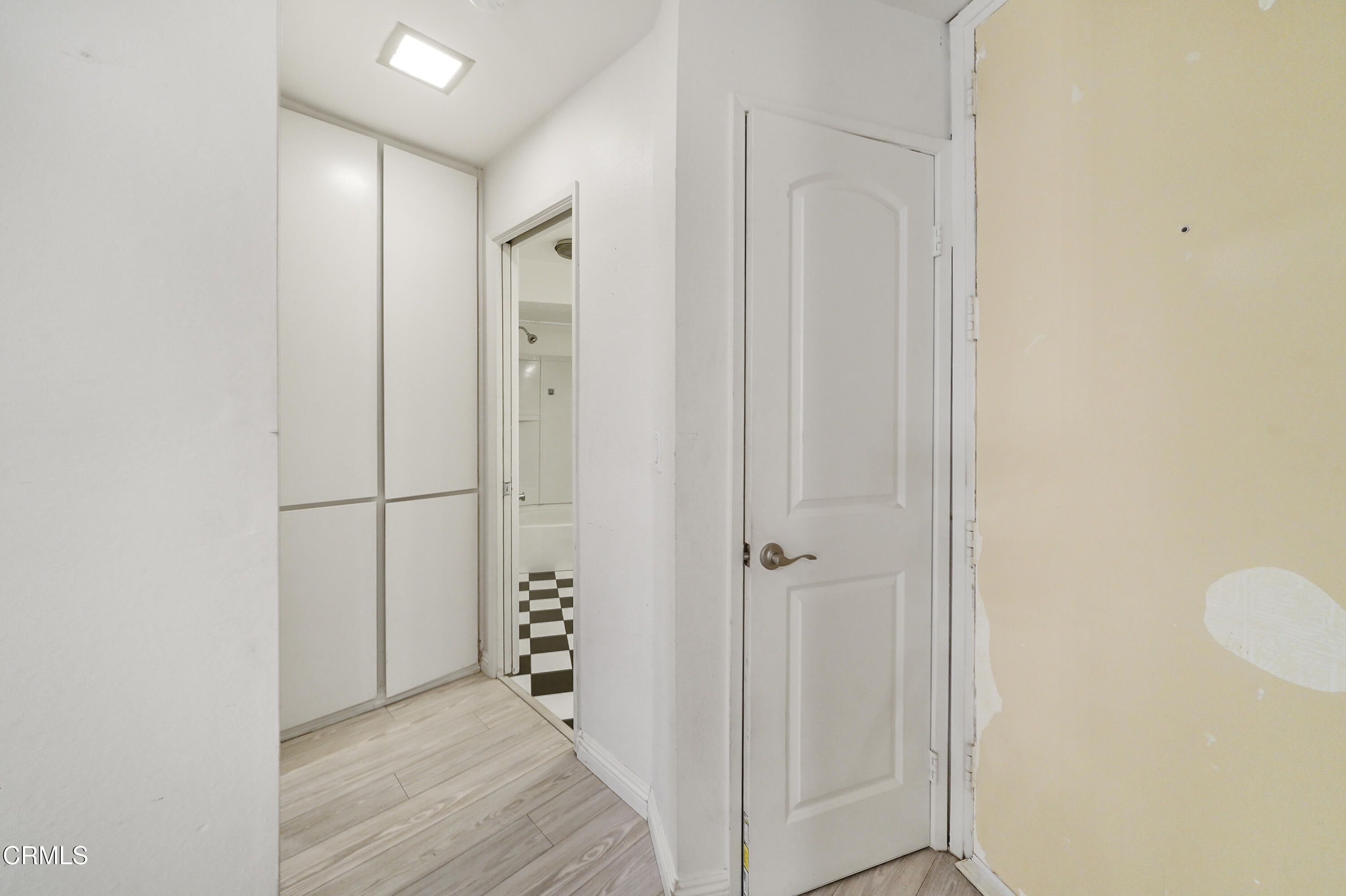 3101 Peninsula Road, Unit 107 Oxnard, CA 93035 - Photo 7 of 24 a view of a bathroom with wooden floor