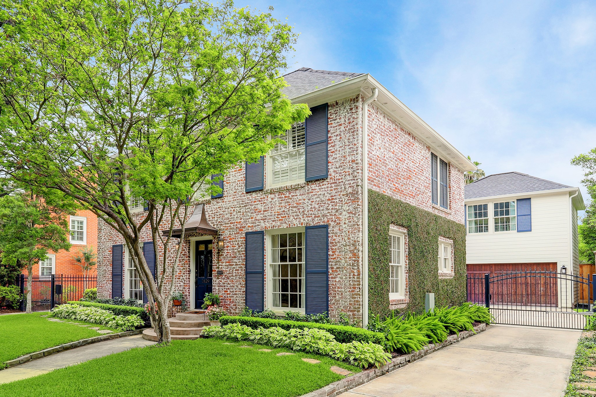 2829 Sunset Boulevard West University Place, TX 77005 - Photo 1 of 19 front view of a house with a yard