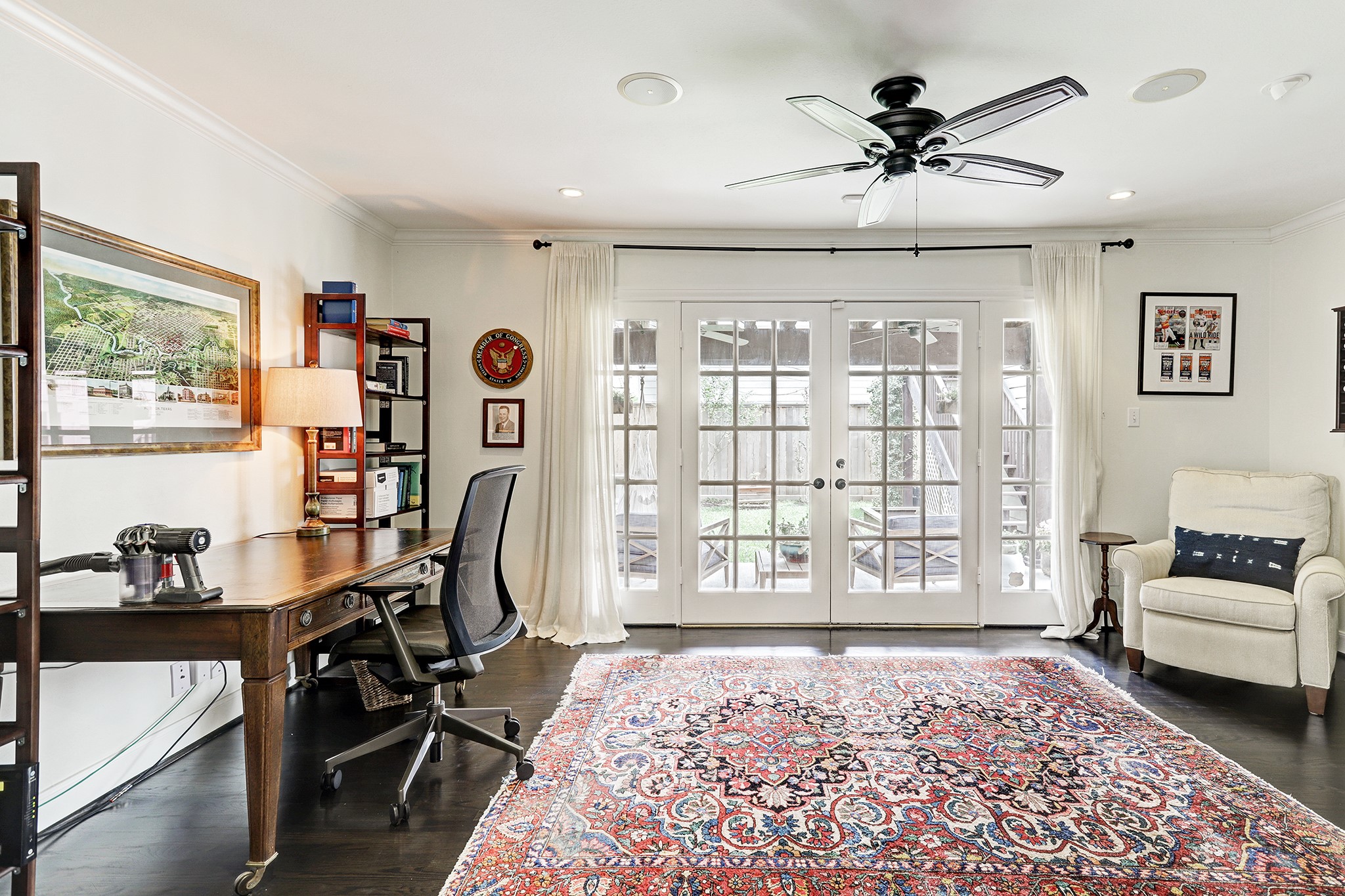 2829 Sunset Boulevard West University Place, TX 77005 - Photo 3 of 19 a view of a livingroom with furniture and workspace
