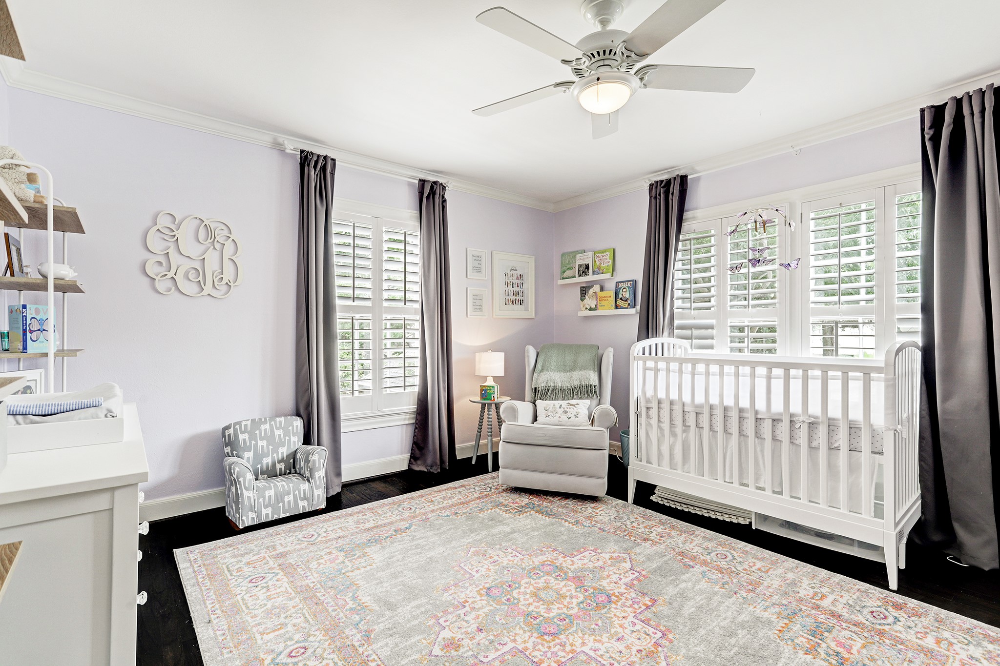 2829 Sunset Boulevard West University Place, TX 77005 - Photo 9 of 19 a bedroom with a bed and a window