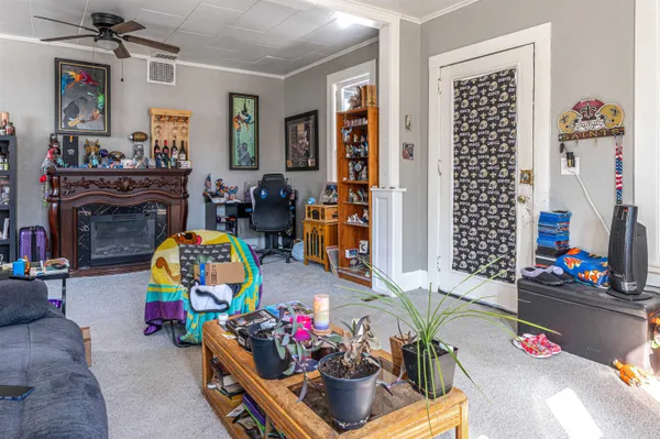 a living room with furniture and toys