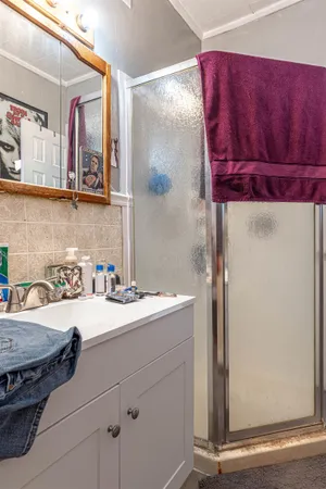 a bathroom with a sink and a mirror