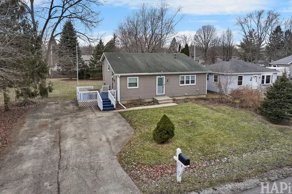 front view of a house with a yard