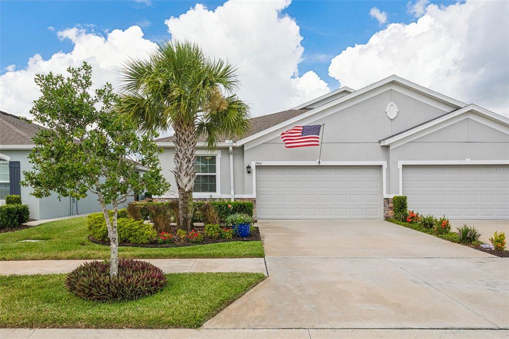 7451 Stonebrook Circle Wesley Chapel, FL 33545 - Photo 1 of 1 Two car garage entry.